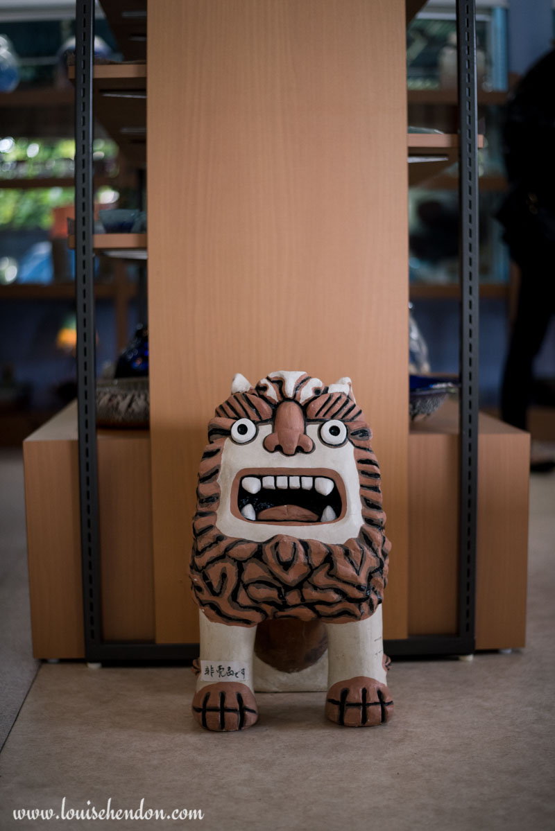 shisas lion dog statues yomitan pottery village okinawa japan