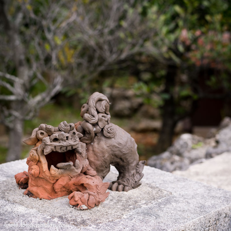 shisas lion dog statues yomitan pottery village okinawa japan