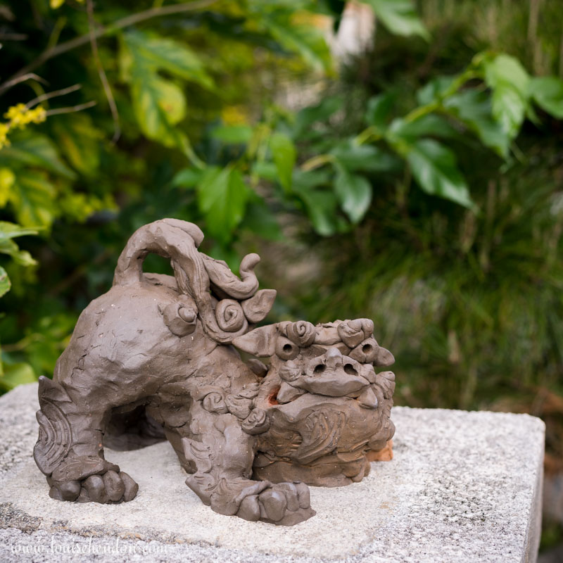 shisas lion dog statues yomitan pottery village okinawa japan