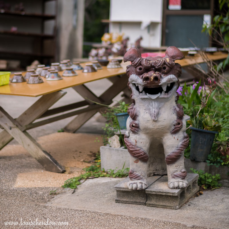 shisas lion dog statues yomitan pottery village okinawa japan