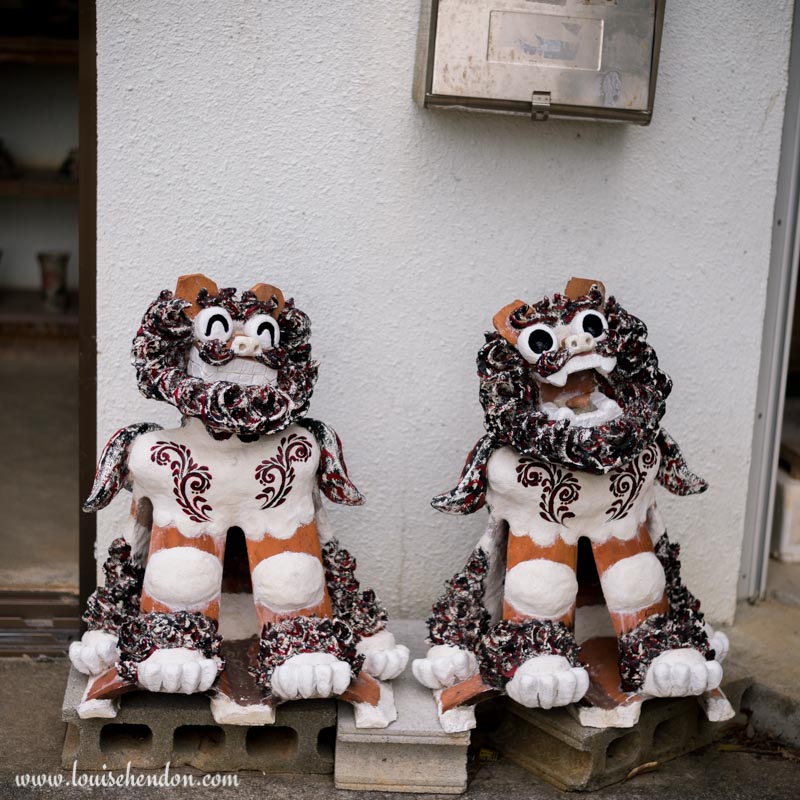 shisas lion dog statues yomitan pottery village okinawa japan